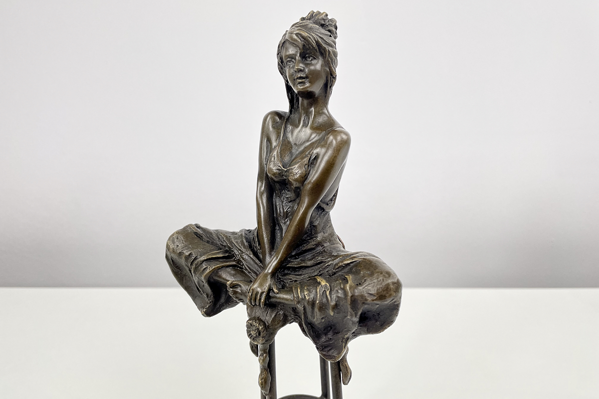 Bronze figure: woman on the stool