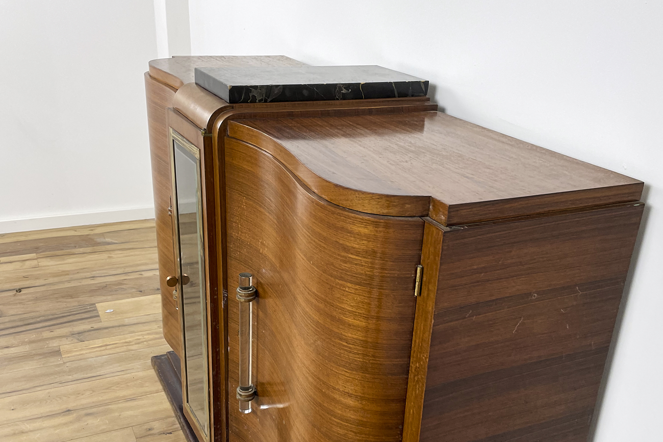 Art Deco chest of drawers in rosewood veneer with glass handles from France around 1925 with a display case