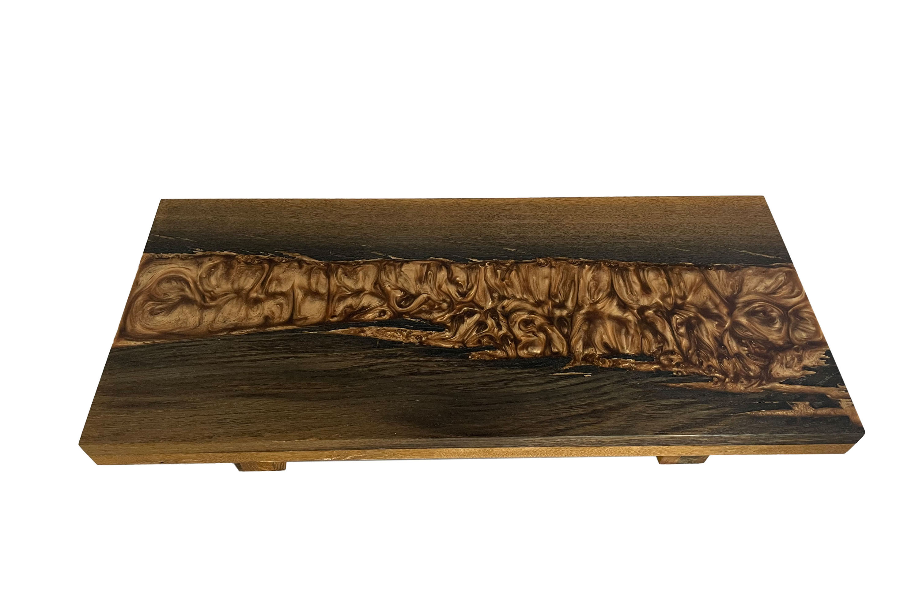 Cutting board made of bog oak refined with copper-colored expocide resin