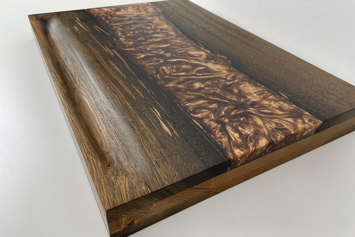 Bog oak and golden epoxy Cutting board