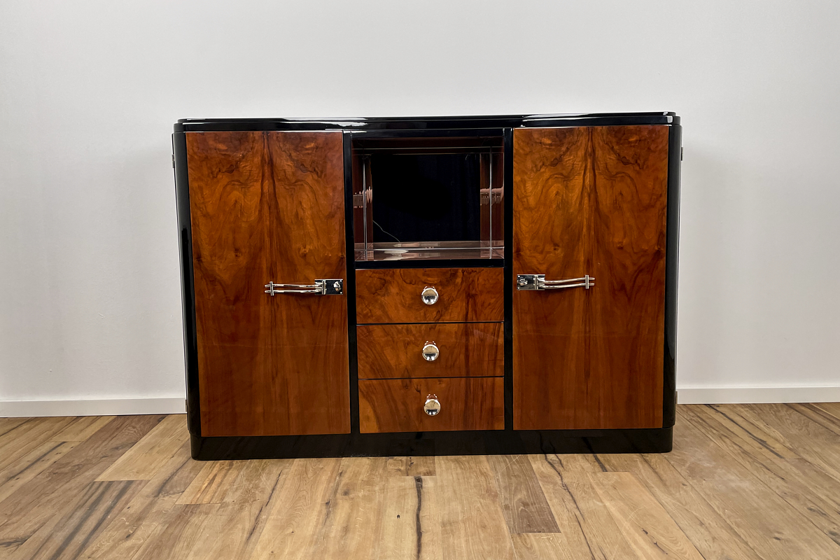 Art Deco highboard with a fantastic veneer and mirrored compartment, the original handles have been newly chrome-plated
